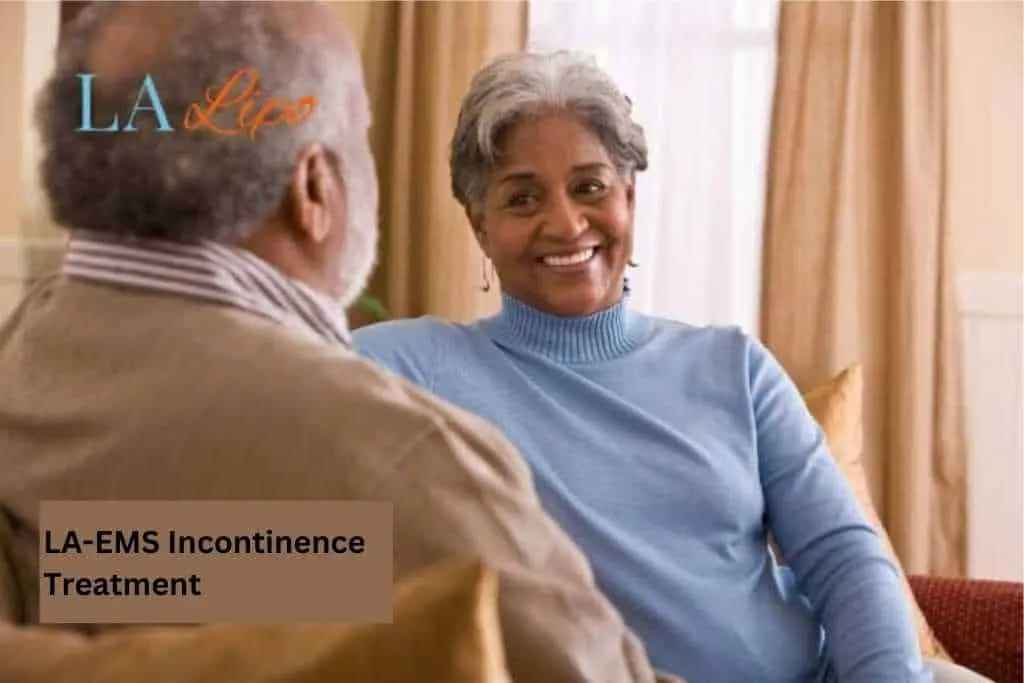 Couple sat smiling at each other - LA-EMS treatment Whitley Sands
