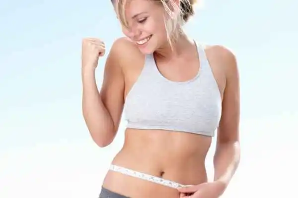 woman happy after fat reduction treatment Whitley Sands